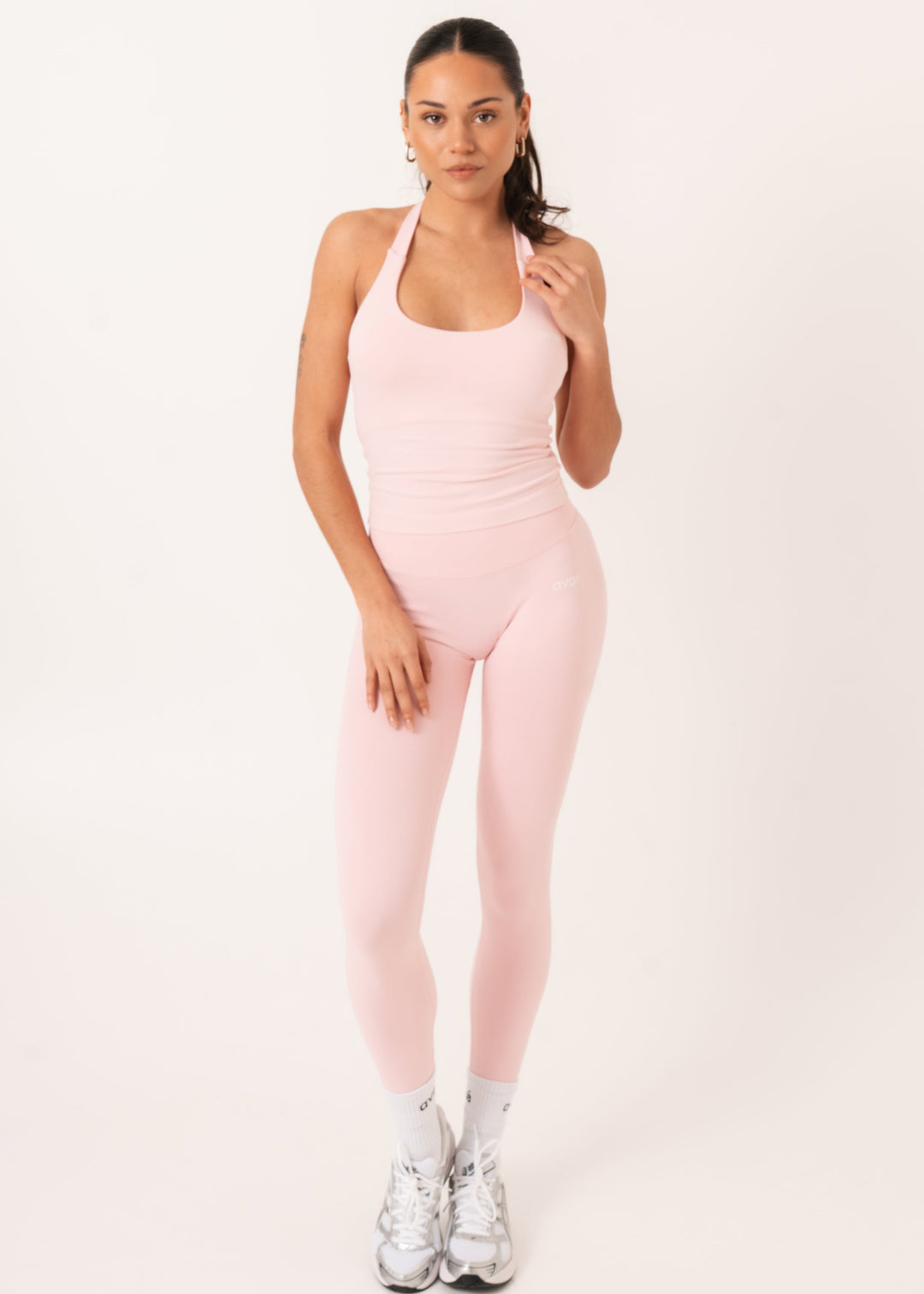 Woman wearing an Avae Wear compression legging set