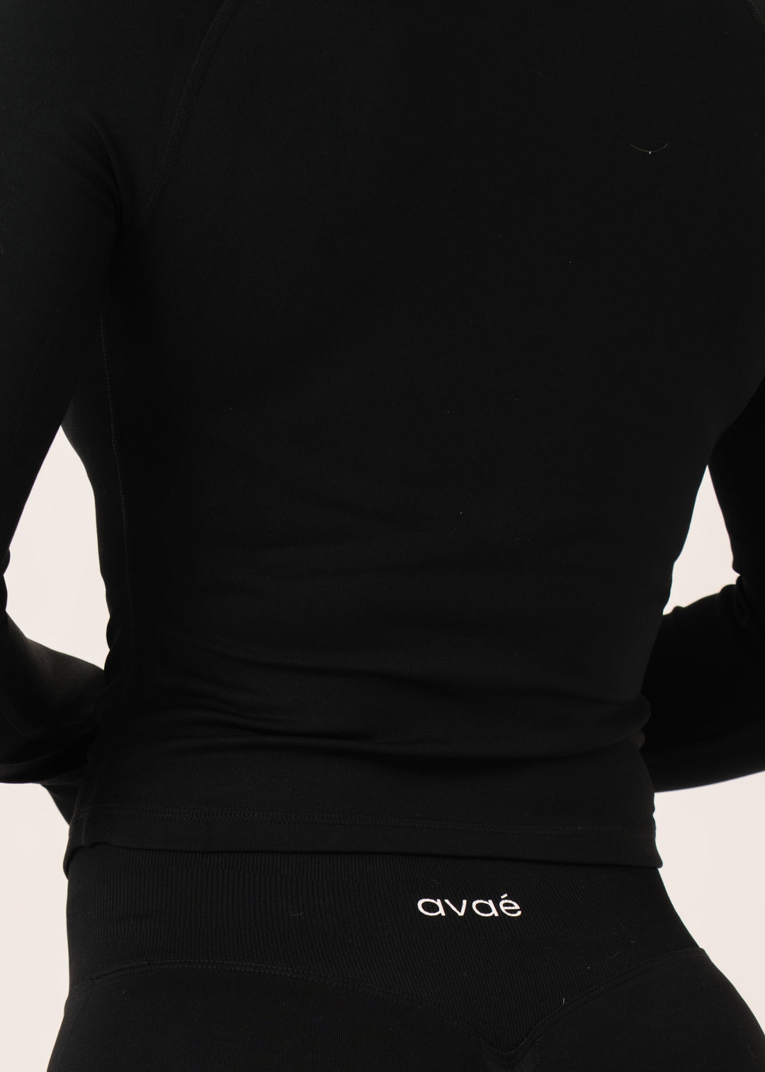 Enhance Half Zip Jacket Black - Shape-Enhancing Fit Achteraanzicht - Avae Wear