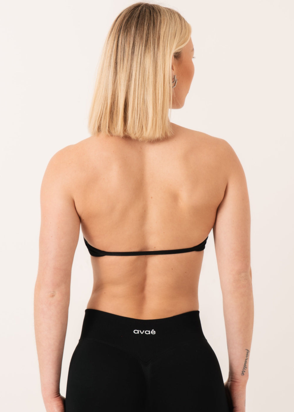 Enhance Strappy Sports Bra Black - Supportive Workout Bra Side View - Avae Wear