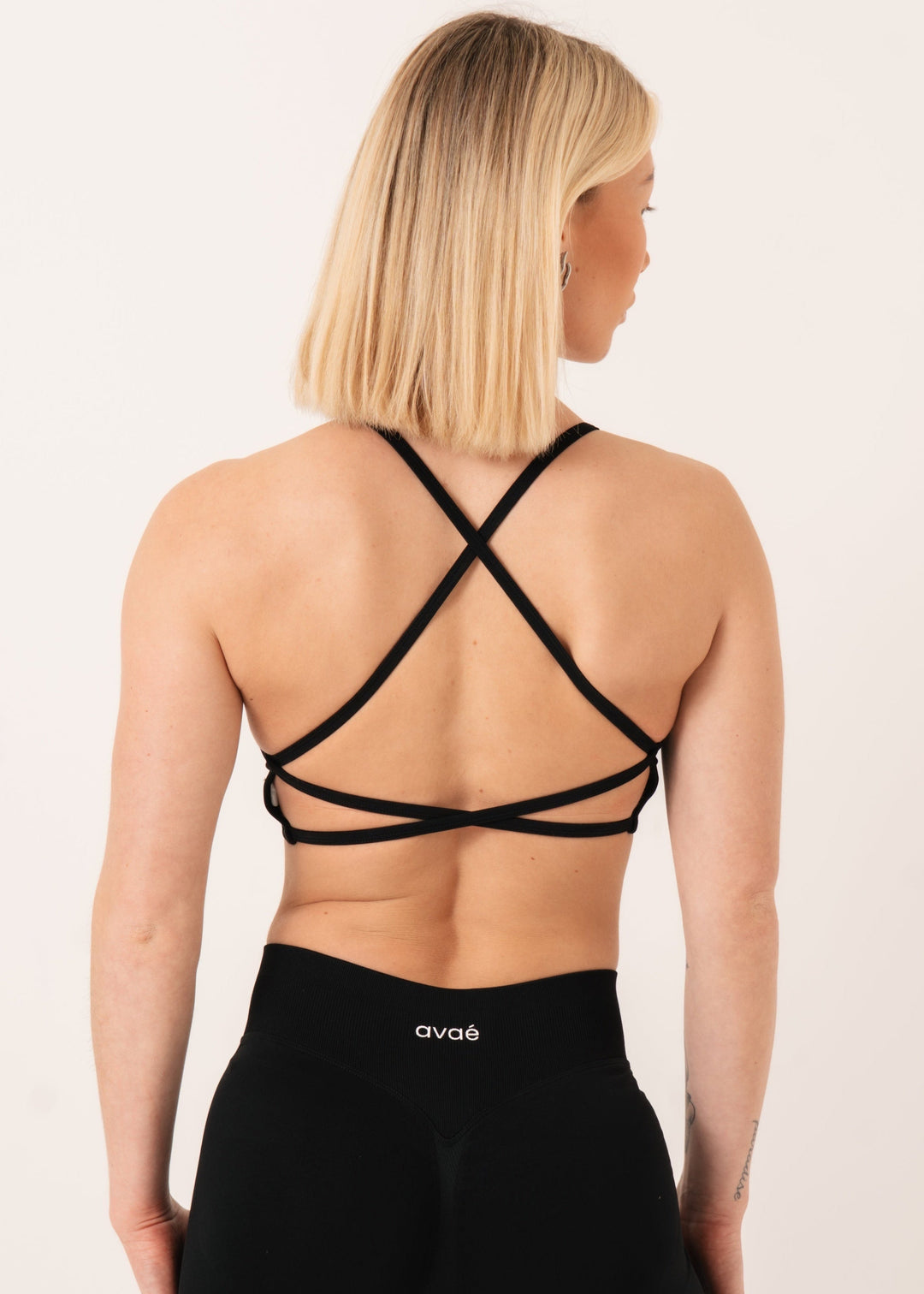 Enhance Crossback Sports Bra Black - Supportive Workout Bra Side View - Avae Wear